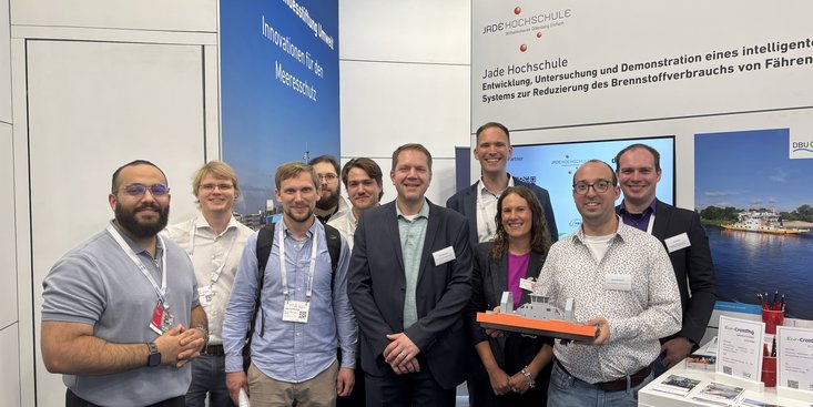 Gruppenfoto auf dem Messestand